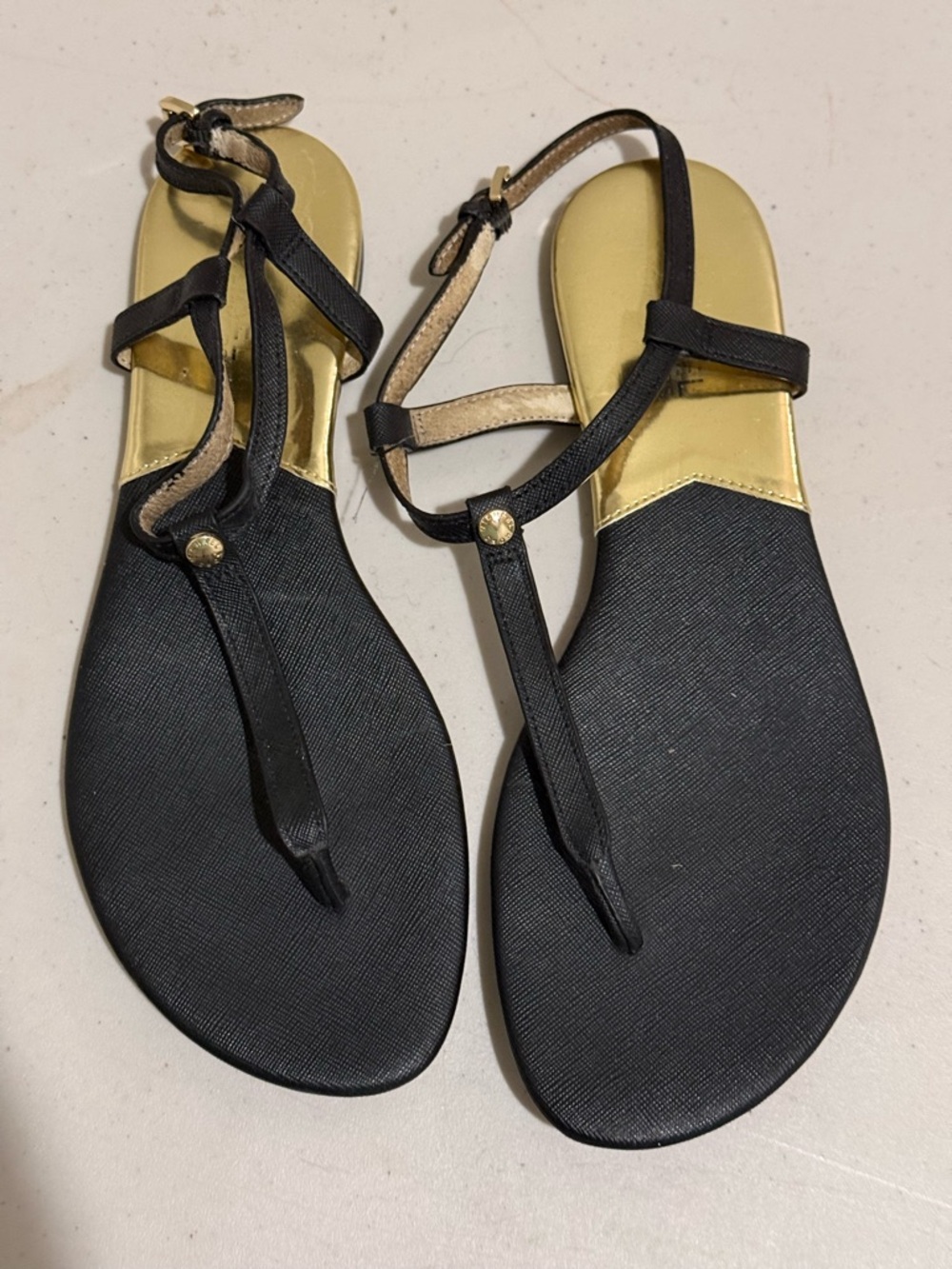 MICHAEL Michael Kors Black and Gold T-Strap Flat Sandals